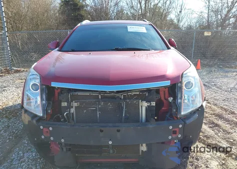 2014 Cadillac Srx Luxury Collection z USA, uszkodzony, nr VIN 3GYFNBE34ES653077